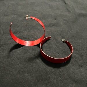 Red hoop earrings